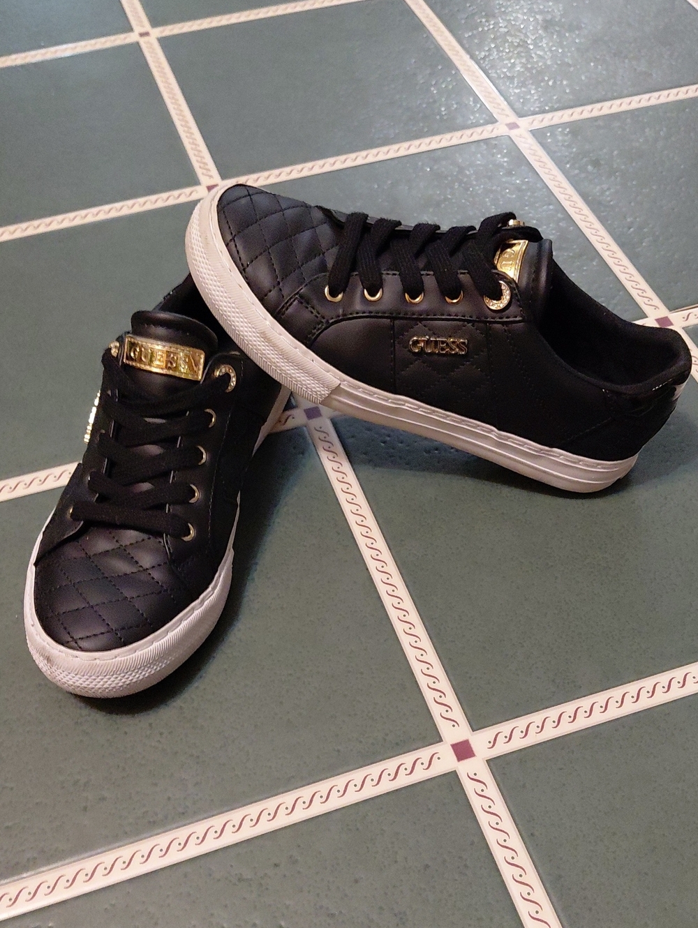 GUESS Black Quilted Sneakers with Gold Accents